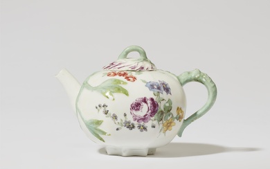 A Meissen porcelain teapot with floral finial