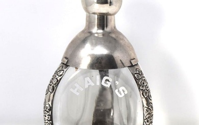A Mexican Silver Mounted Glass Decanter, Haig whisky engraved