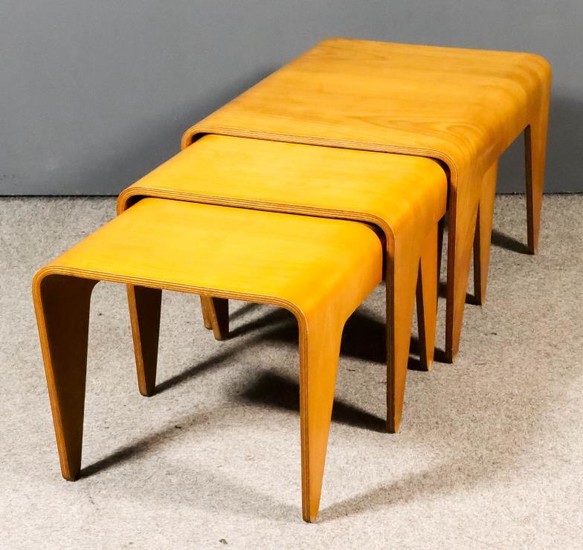 A Nest of Three Bent Beech Plywood Occasional Tables,...