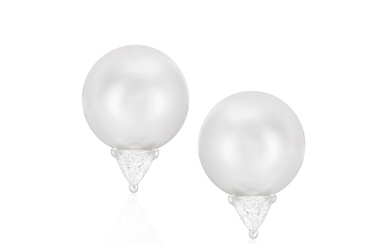 A PAIR OF CULTURED PEARL AND DIAMOND EARRINGS Each round-sh...