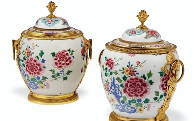 A PAIR OF FRENCH ORMOLU-MOUNTED CHINESE EXPORT FAMILLE ROSE PORCELAIN BOWLS AND COVERS, THE MOUNTS LATE 18TH/19TH CENTURY, THE PORCELAIN YONGZHENG PERIOD (1723-1735) AND LATER, THE LIDS ASSOCIATED