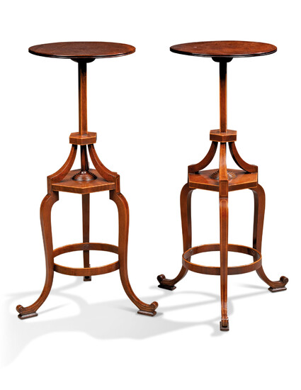 A PAIR OF GEORGE III MAHOGANY TRIPOD STANDS