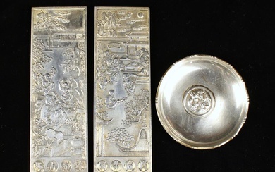A Pair of Chinese White Metal Plaques intricately cast in relief with figural scenes in rectangular