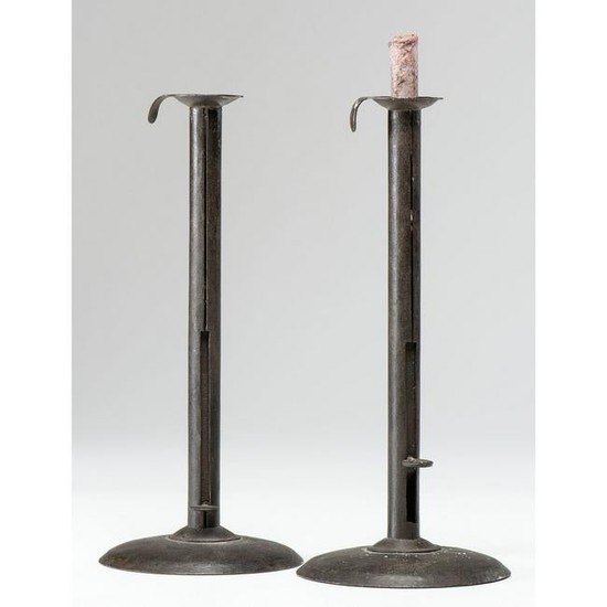 A Pair of Iron Hog Scraper Candlesticks
