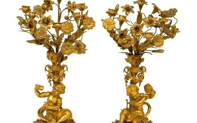 A Pair of Louis XV Style Six-Light Gilt Bronze Figural