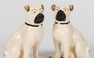 A Pair of Staffordshire Earthenware Pugs