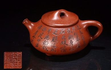 A RED MUD CARVED POETRY PATTERN TEA POT