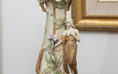 A Royal Dux Art nouveau style figural vase, depicting a lady holding a flower. marked 2187 to base, Height 31cm.