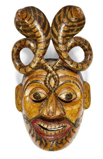 A South Indian papier mache wood dance mask, Kerala, India, late 19th-early 20th century, 31.5cm. high Provenance: Private Collection of Werner Forman (1921-2010); acquired 1991 from Allan and Karen Beagle.