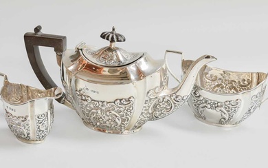 A Three-Piece Victorian Silver Tea-Service, by Florence Warden, Chester, 1895,...