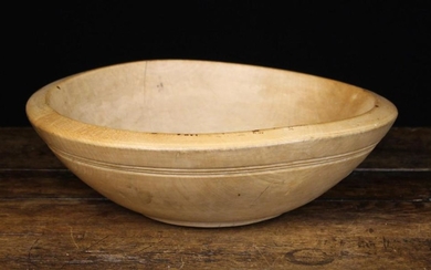 A Turned Sycamore Dairy Bowl, 11 cm high, 37 cm in diameter (4½'' h. 14½'' dia.)