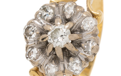 A VINTAGE 18CT GOLD DIAMOND DAISY CLUSTER RING; white gold...