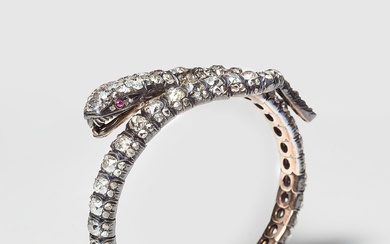 A Victorian 14k gold silver and European old-cut diamond snake bangle.