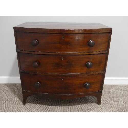 A Victorian mahogany bow front Chest of Drawers, with three ...