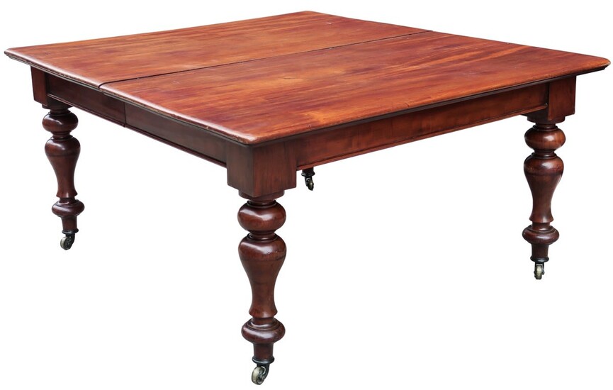A Victorian mahogany dining table, 19th Century. With one...