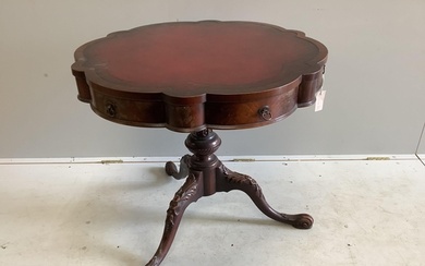 A Victorian style circular mahogany tripod centre table, wit...