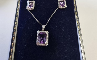 A White Gold, Diamond and Amethyst set to include a Pendant ...