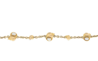 A bracelet, designed as a series of alternating conches, with seed pearl highlights.