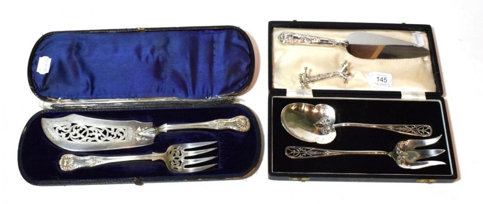 A cased pair of Victorian silver fish-servers, by Henry John...