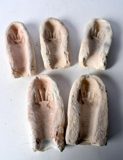 A collection of Egyptian Clay moulds. 19cm (4).