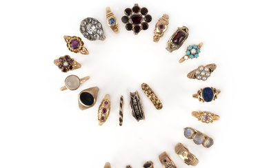 A collection of rings, comprising: two ruby rings, an onyx signet ring; two turquoise rings; a