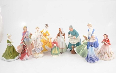 A collection of twelve bone china figurines