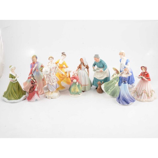 A collection of twelve bone china figurines