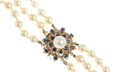 A cultured pearl three-row necklace, with sapphire and cultured pearl cluster clasp.