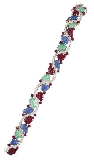 A diamond and gem bracelet, composed of a series of...