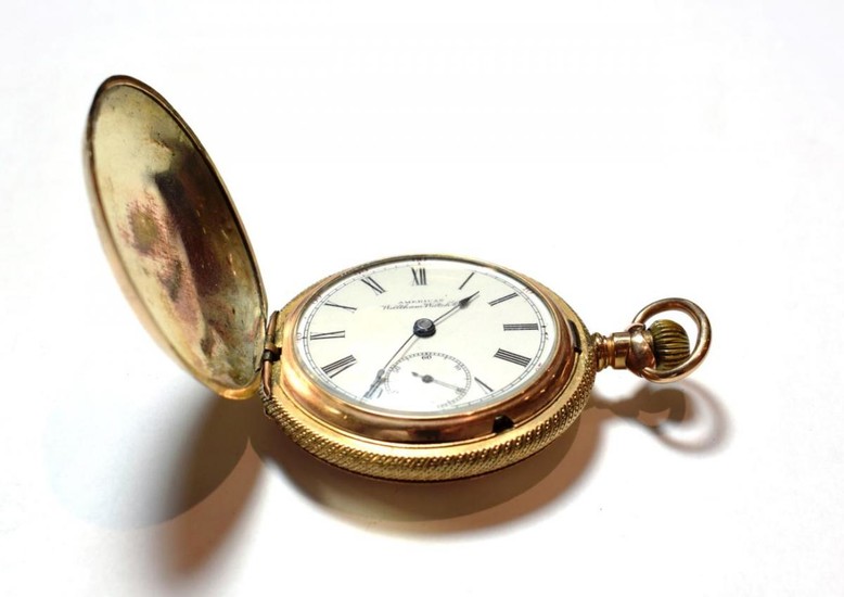 A gold plated full hunter pocket watch, signed Waltham Watch...
