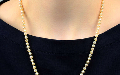 A graduated natural pearl single-strand necklace, with old-cut diamond clasp.