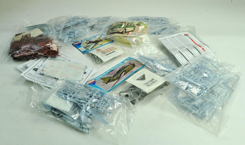 A group of plastic model kits comprising various