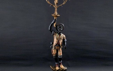 A lacquered, painted and gilt wood torch-holder moor