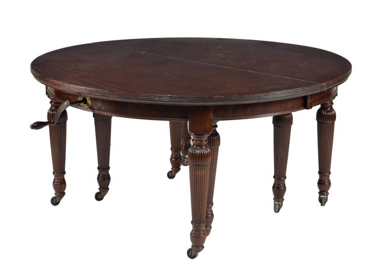 A late Victorian mahogany extending dining table
