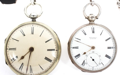 A late Victorian silver pocket watch with another pocket watch and four curb link albert chains