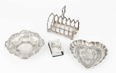 A late Victorian silver seven bar toast rack, of shaped...