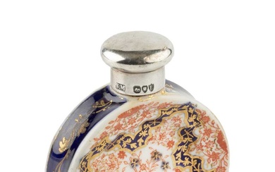 A late Victorian silver topped porcelain novelty scent bottle, in...