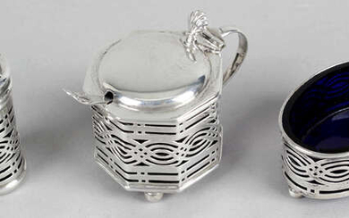 A late Victorian/Edwardian matched silver condiment set with pierced decoration.