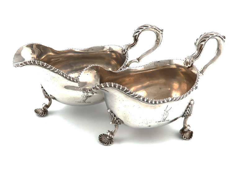 A matched pair of George III silver sauce boats