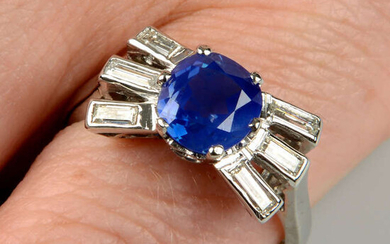 A mid 20th century platinum, Kashmir sapphire and baguette-cut diamond ring.
