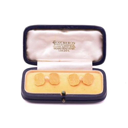 A pair of 18 carat gold cufflinks in an associated Boucheron...