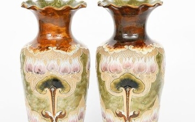 A pair of Art Nouveau Doulton Lambeth stoneware vases by Elisa Simmance, shouldered form, slip decorated with tulip flower panels in pink, green and white on a buff ground, impressed marks, one with incised artist monogram, restoration, 41cm. high, (2)