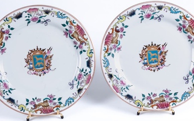 A pair of Chinese export-style porcelain armorial dishes decorated...