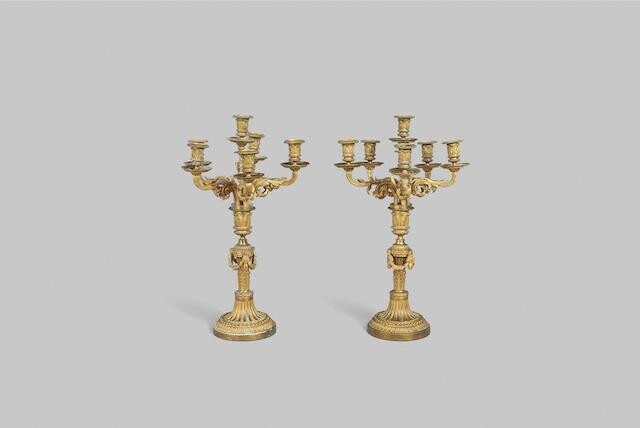 A pair of French ormolu six light candelabra