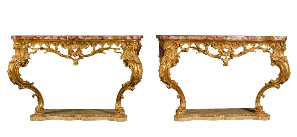 A pair of George III style carved giltwood console tables, each with the Sicilian jasper marble top on a faux marble base, 85cm high x 130cm wide