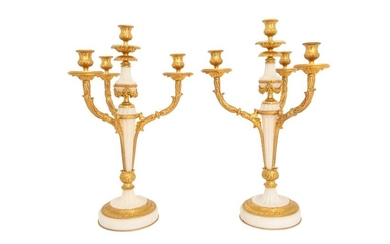 A pair of Louis XVI white marble candelabra