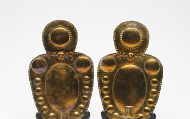 A pair of brass candlesticks, 20th century.