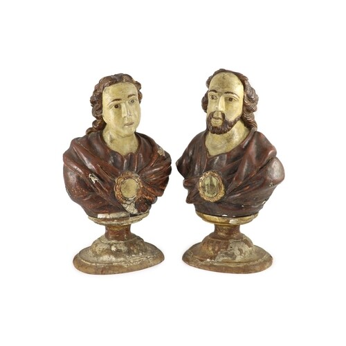 A pair of early 19th century Spanish carved and painted bust...