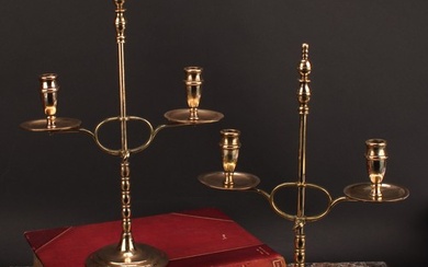A pair of early 20th century brass two-light adjustable cand...