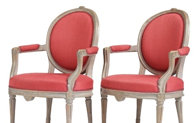 A pair of gustavian armchairs by J E Öhrmark.